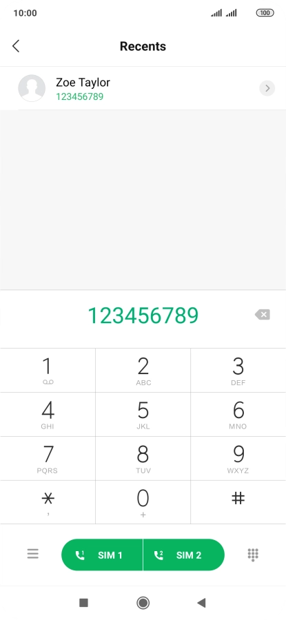 Key in the required number and press the call icon next to the required SIM.