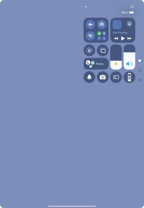 Slide your finger up or down on the screen to select the required Control Centre page.