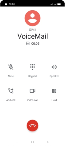 Press the end call icon.