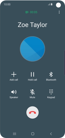 Press the end call icon.
