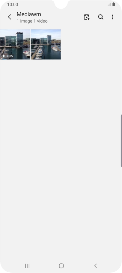 Press and hold any picture or video clip.