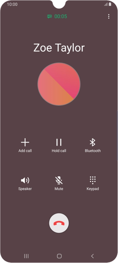 Press the end call icon.