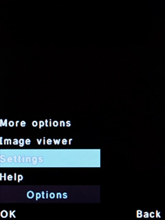 Select Settings and press the Left selection key.