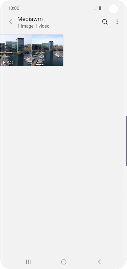 Press and hold any picture or video clip. Press and hold any picture or video clip.