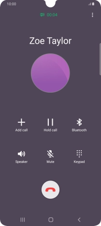 Press the end call icon.