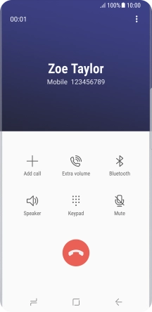 Press the end call icon.