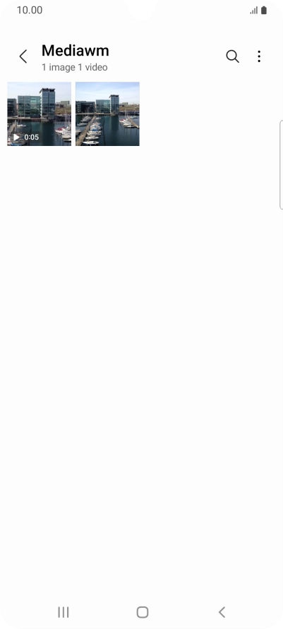 Press and hold any picture or video clip. Press and hold any picture or video clip.