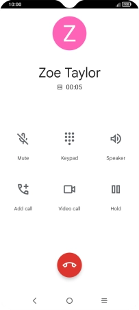 Press the end call icon.
