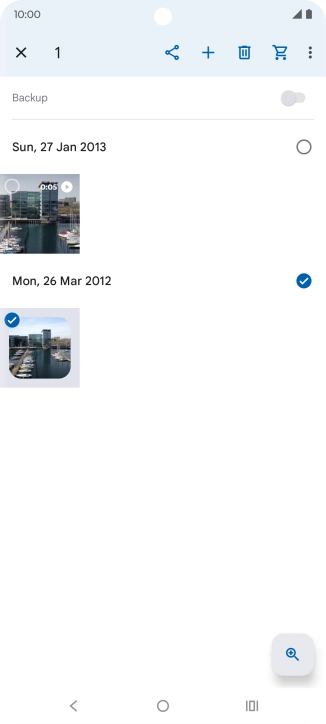 Press the required pictures or videos to select them.