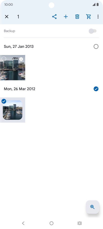 Press the required pictures or videos to select them.
