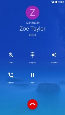 Press the end call icon.