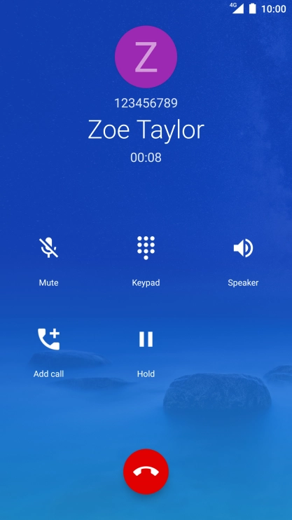 Press the end call icon.