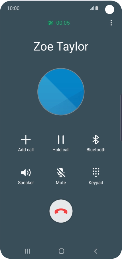Press the end call icon.