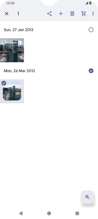 Press the required pictures or videos to select them.