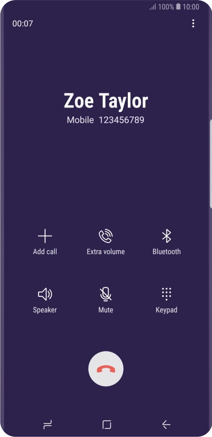 Press the end call icon.