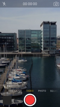 Slide your finger right or left on the screen to select PHOTO.