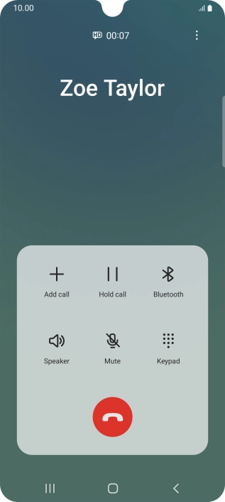 Press the end call icon.