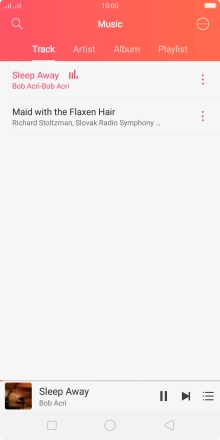 Press the song title at the bottom of the screen.