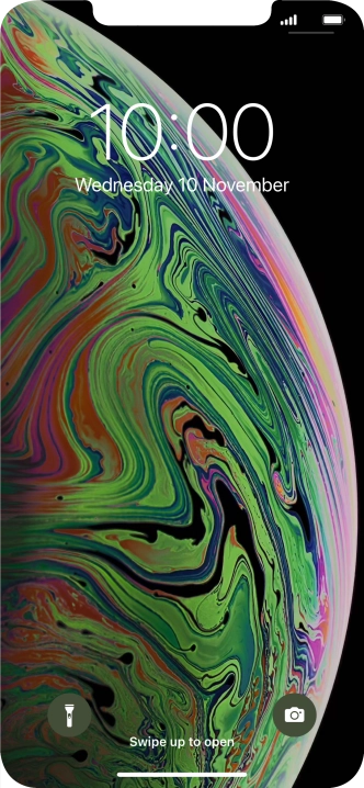 Slide your finger upwards starting from the bottom of the screen.