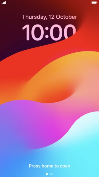 Press and hold anywhere on the lock screen.