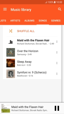 Press the song title at the bottom of the screen.