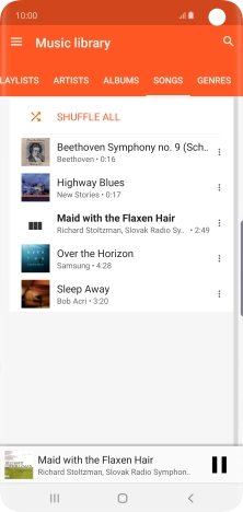 Press the song title at the bottom of the screen.