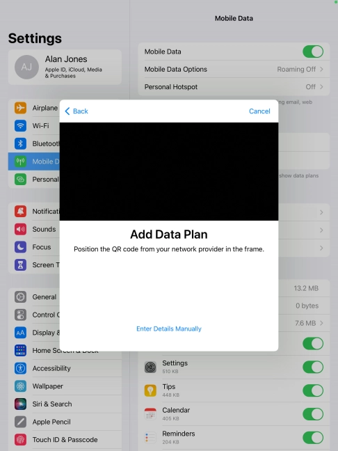 Place the QR code you've received inside the tablet camera frame to scan the code.