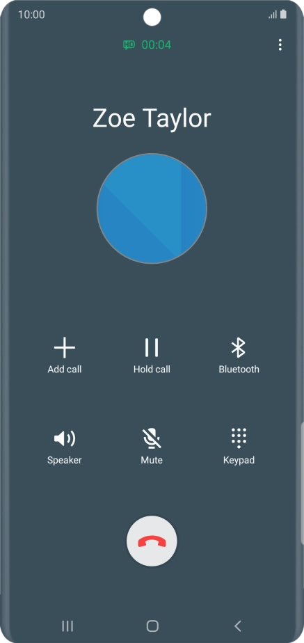 Press the end call icon.