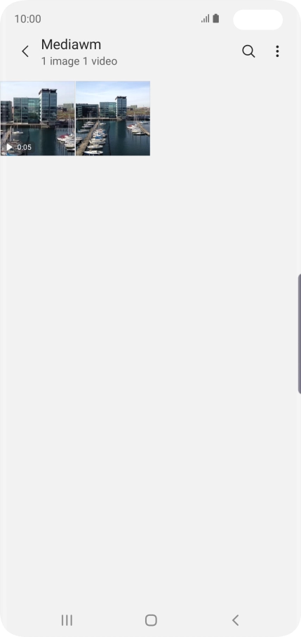 Press and hold any picture or video clip. Press and hold any picture or video clip.