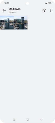 Press and hold any picture or video.