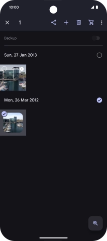 Press the required pictures or videos to select them.