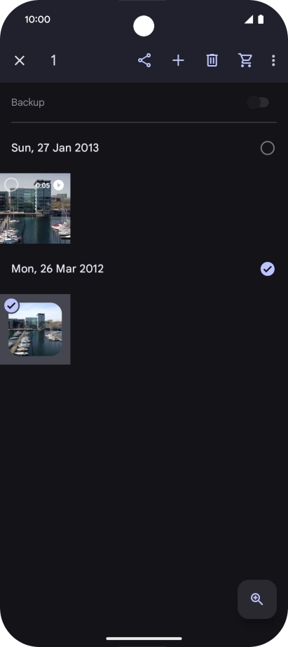 Press the required pictures or videos to select them.