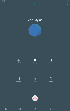 Press the end call icon.
