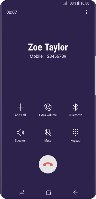 Press the end call icon.