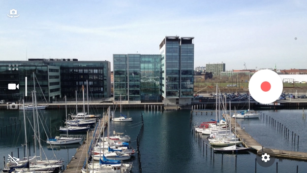 If the camera is turned on, slide your finger downwards on the screen to select the video icon.