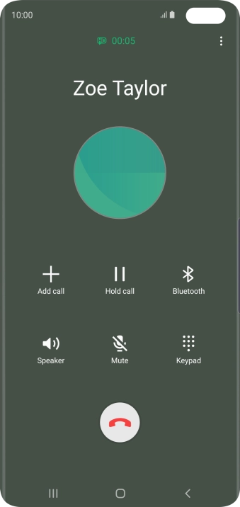 Press the end call icon.