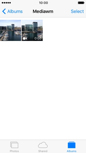 Go to the required folder and press the required picture or video clip.