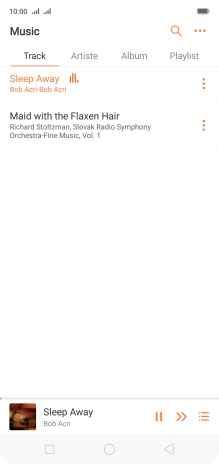 Press the song title at the bottom of the screen.