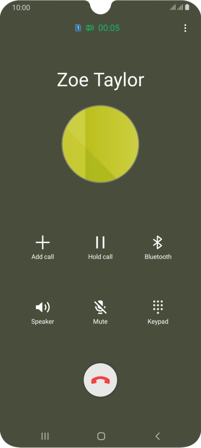 Press the end call icon.