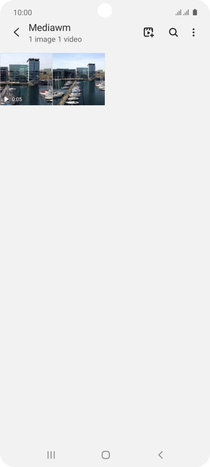 Press and hold any picture or video clip.