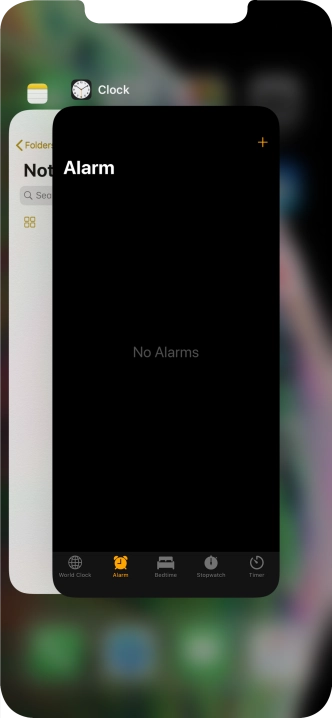 Slide upwards on the required application to end it.