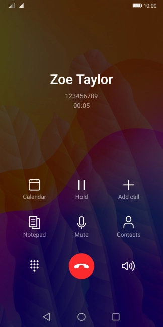 Press the end call icon.