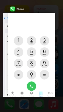 Slide upwards on the required application to end it.