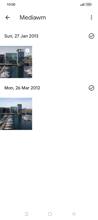 Press and hold any picture or video clip.