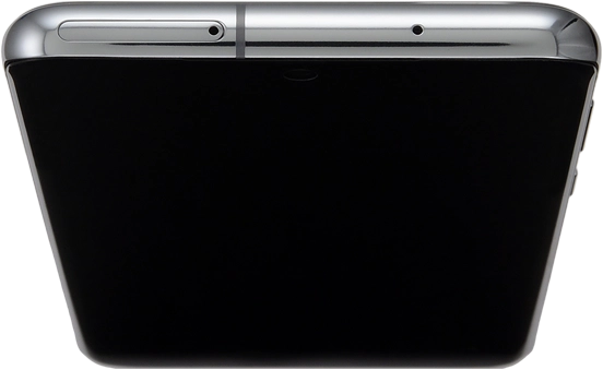 Find the opener for the card holder. Insert the opener into the small hole in the card holder.