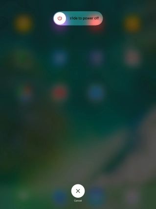 Press and drag the power off icon right.