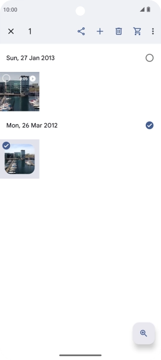 Press the required pictures or videos to select them.