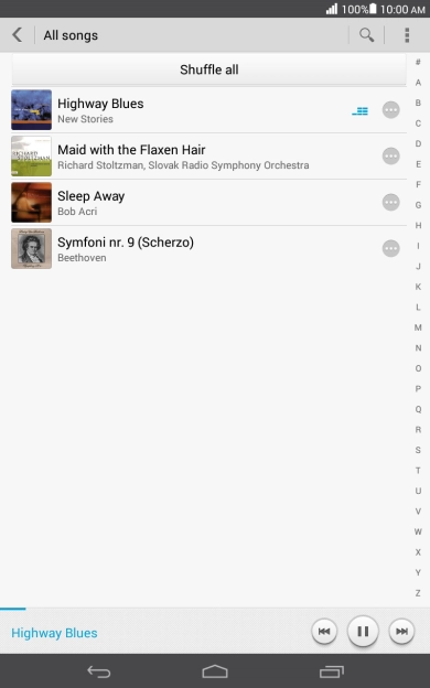 Press the song title at the bottom of the screen.