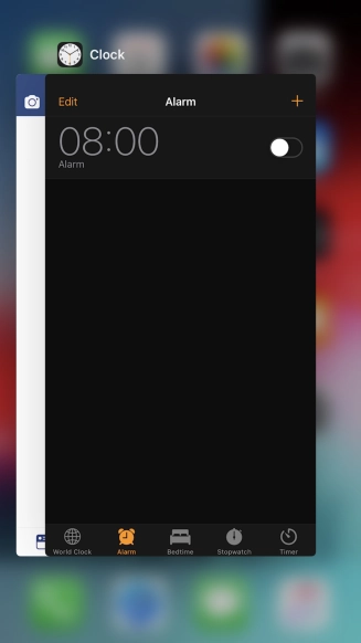 Slide upwards on the required application to end it.