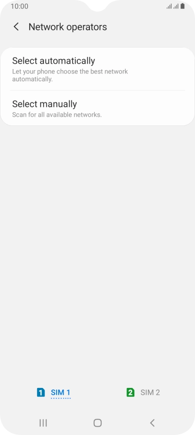 Press Select manually and your phone will search for networks.